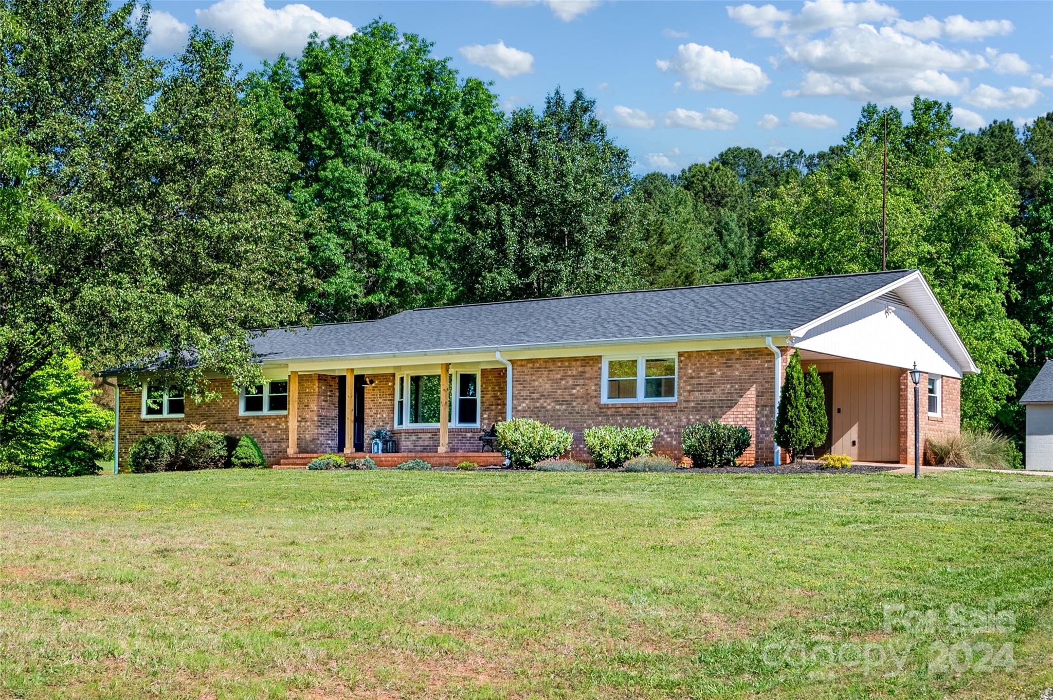 326 Gilbert Road Statesville, NC 28677 - Photo 2 of 25 front view of house with a yard