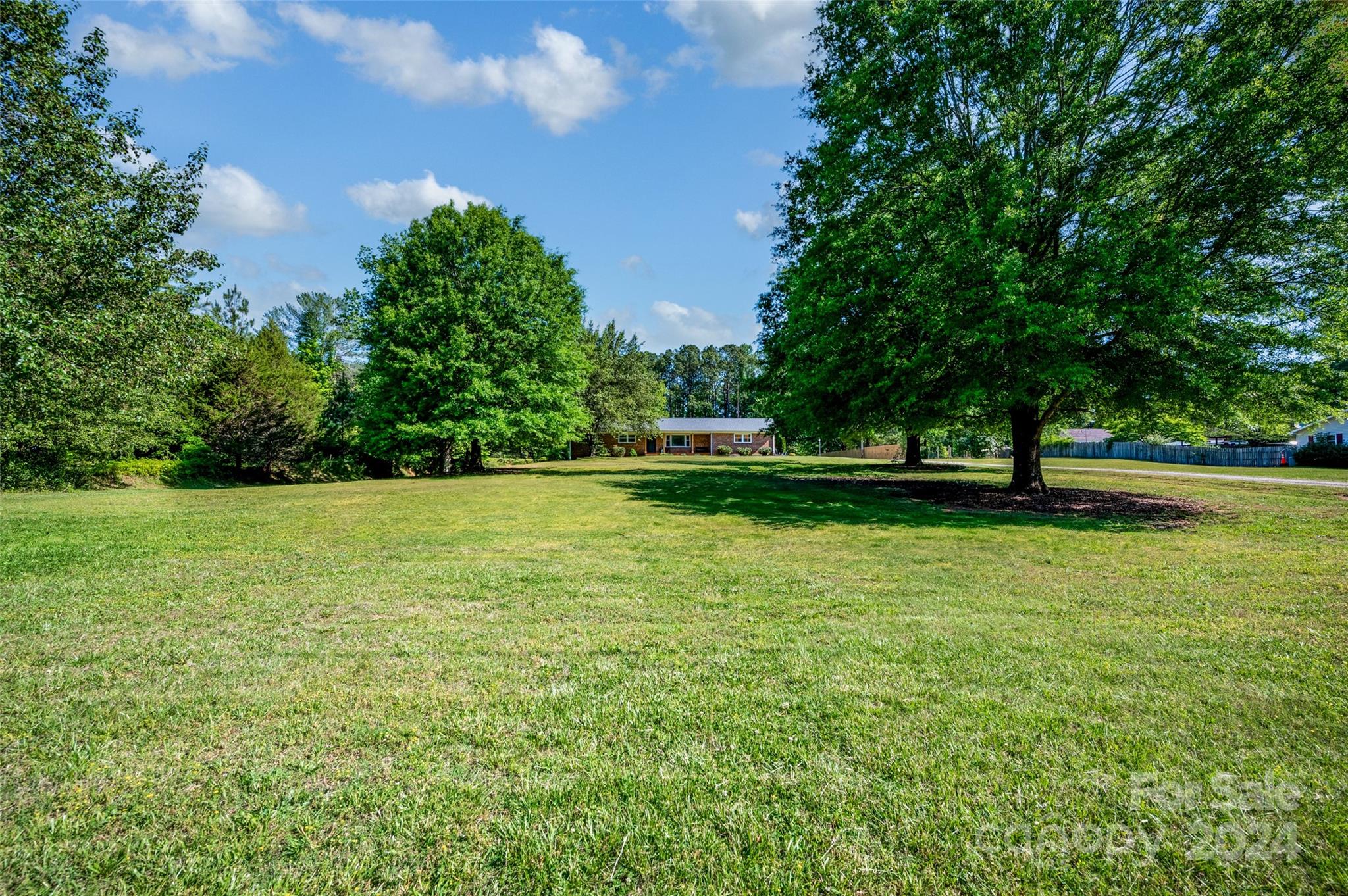 326 Gilbert Road Statesville, NC 28677 - Photo 25 of 25 a view of outdoor space with deck and yard