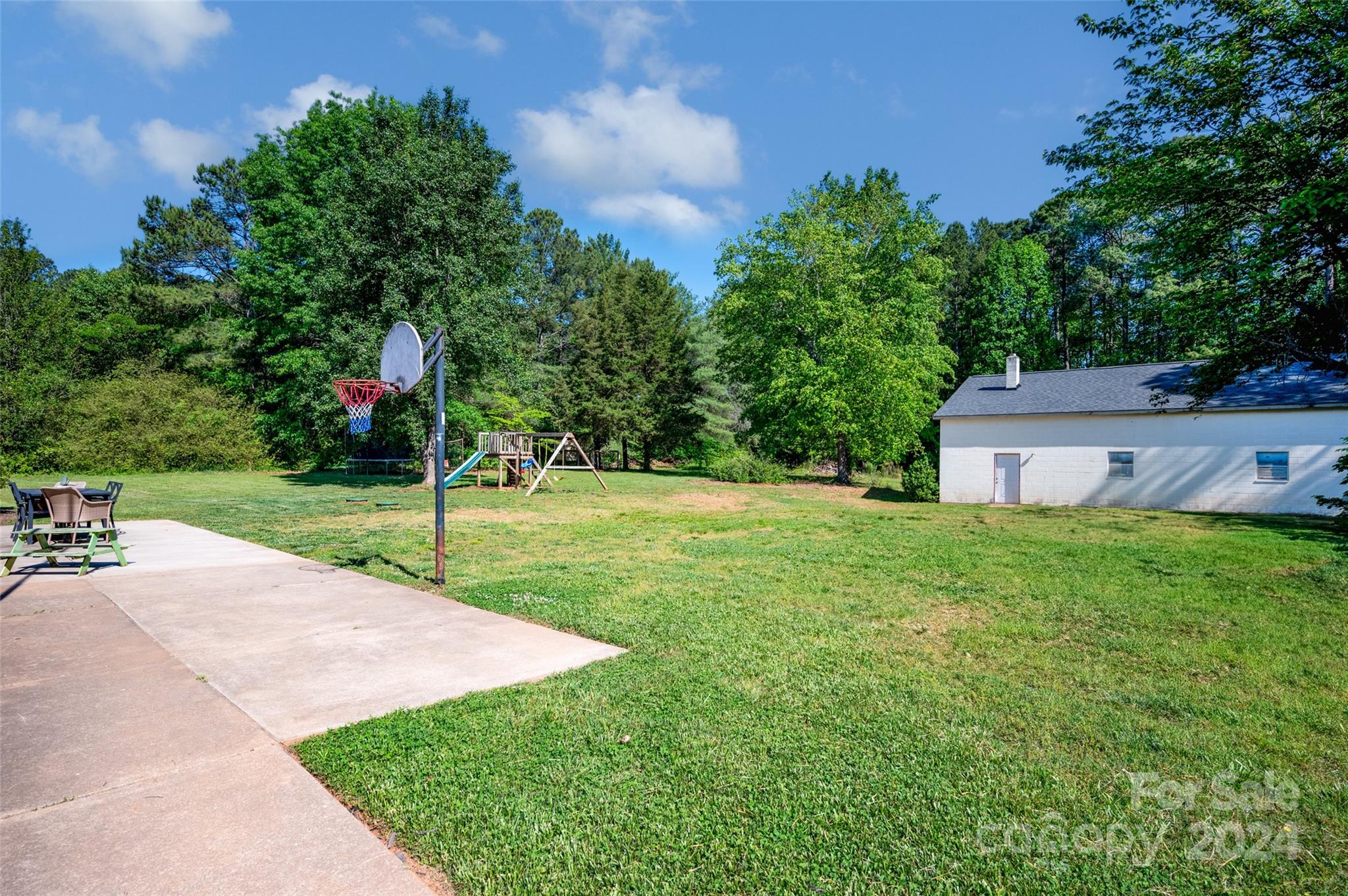 326 Gilbert Road Statesville, NC 28677 - Photo 4 of 25 a view of a house with backyard and garden