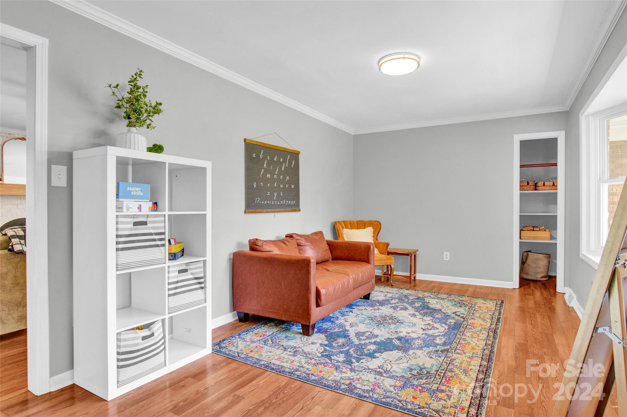 326 Gilbert Road Statesville, NC 28677 - Photo 7 of 25 a living room with furniture and a wooden floor
