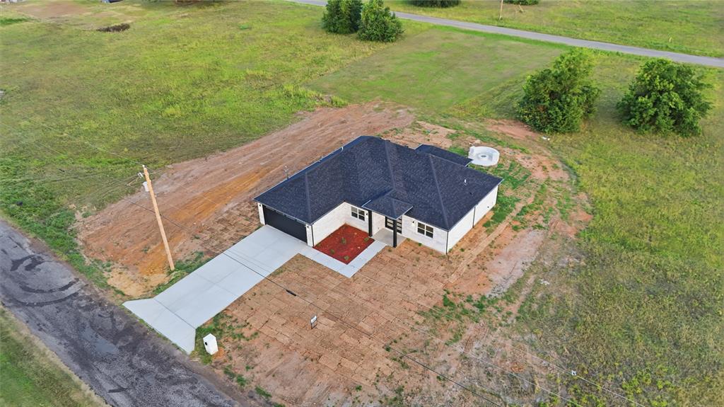 130 Cedar Elm Road Trinidad, TX 75163 - Photo 23 of 27 Single-story residence featuring a dark shingle roof and light-colored siding