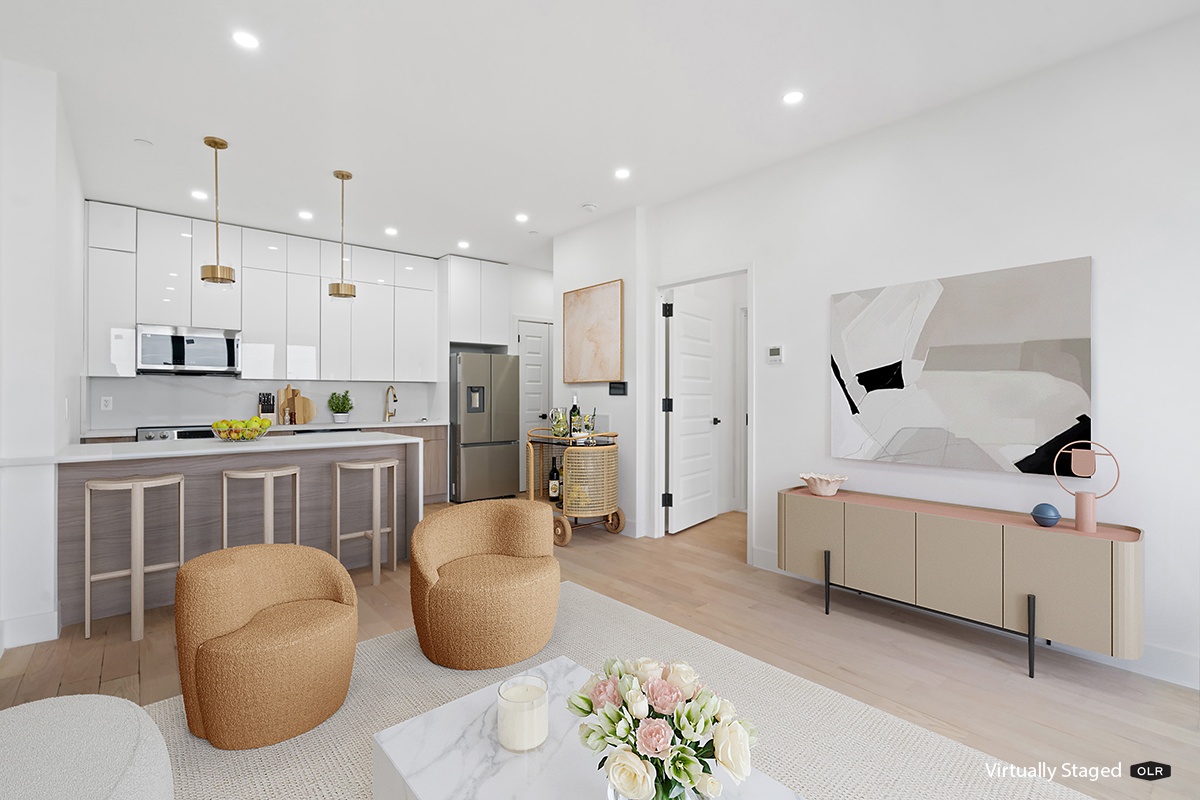 45-29 47th Street, Unit 2A Queens, NY 11377 - Photo 3 of 10 a living room with furniture and kitchen view