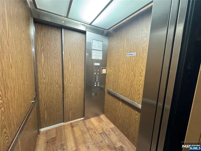 a view of hallway with shower