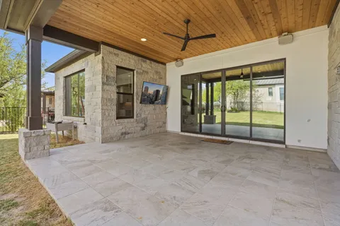 a view of an entrance to house with yard