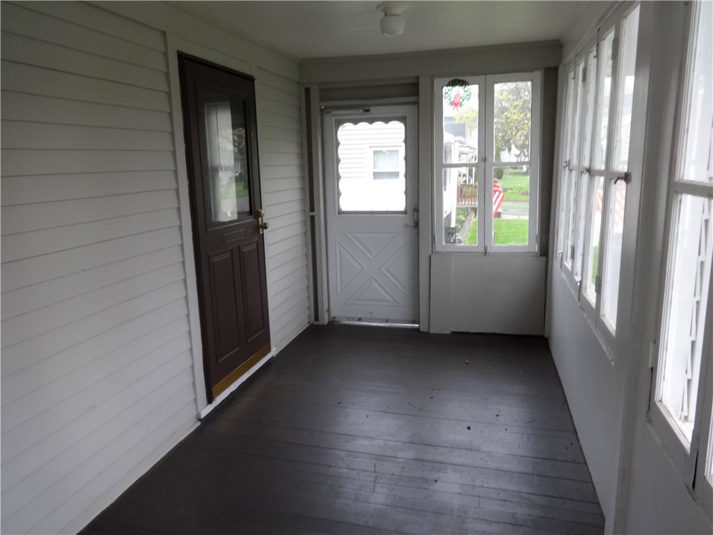 48 Holcomb Street Rochester, NY 14612 - Photo 14 of 24 Enclosed front porch