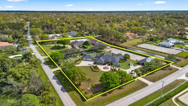 a view of a pool with a ocean view
