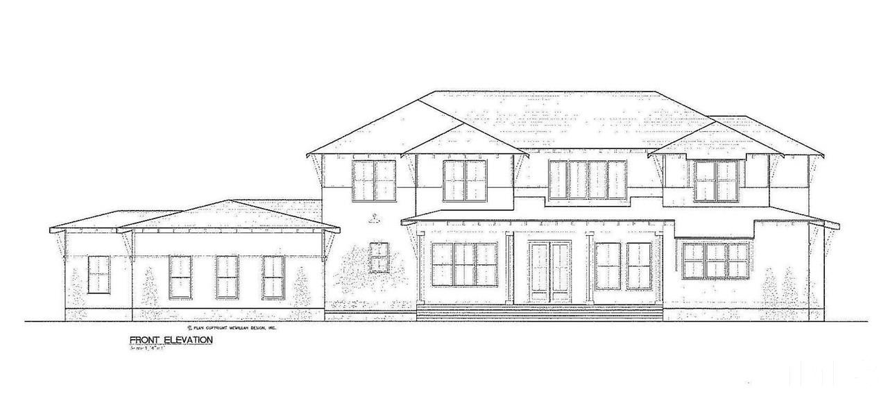 a black and white photo of a house