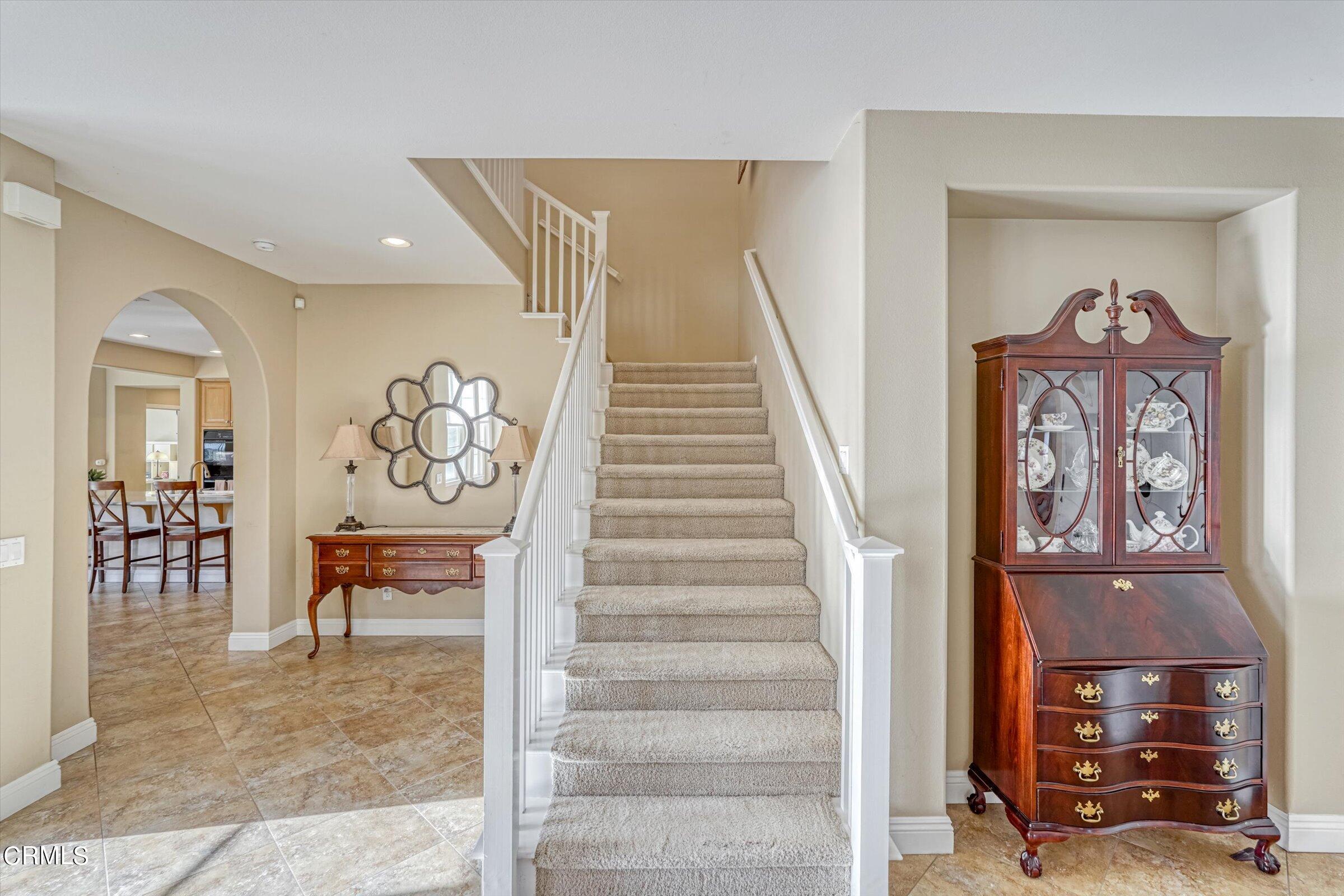 3315 Rising Star Avenue Simi Valley, CA 93063 - Photo 30 of 74 a view of a hallway with wooden floor and windows