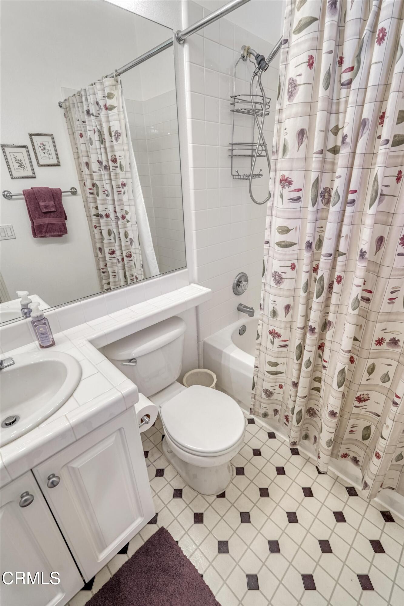 3315 Rising Star Avenue Simi Valley, CA 93063 - Photo 37 of 74 a white toilet sitting next to a bathroom sink