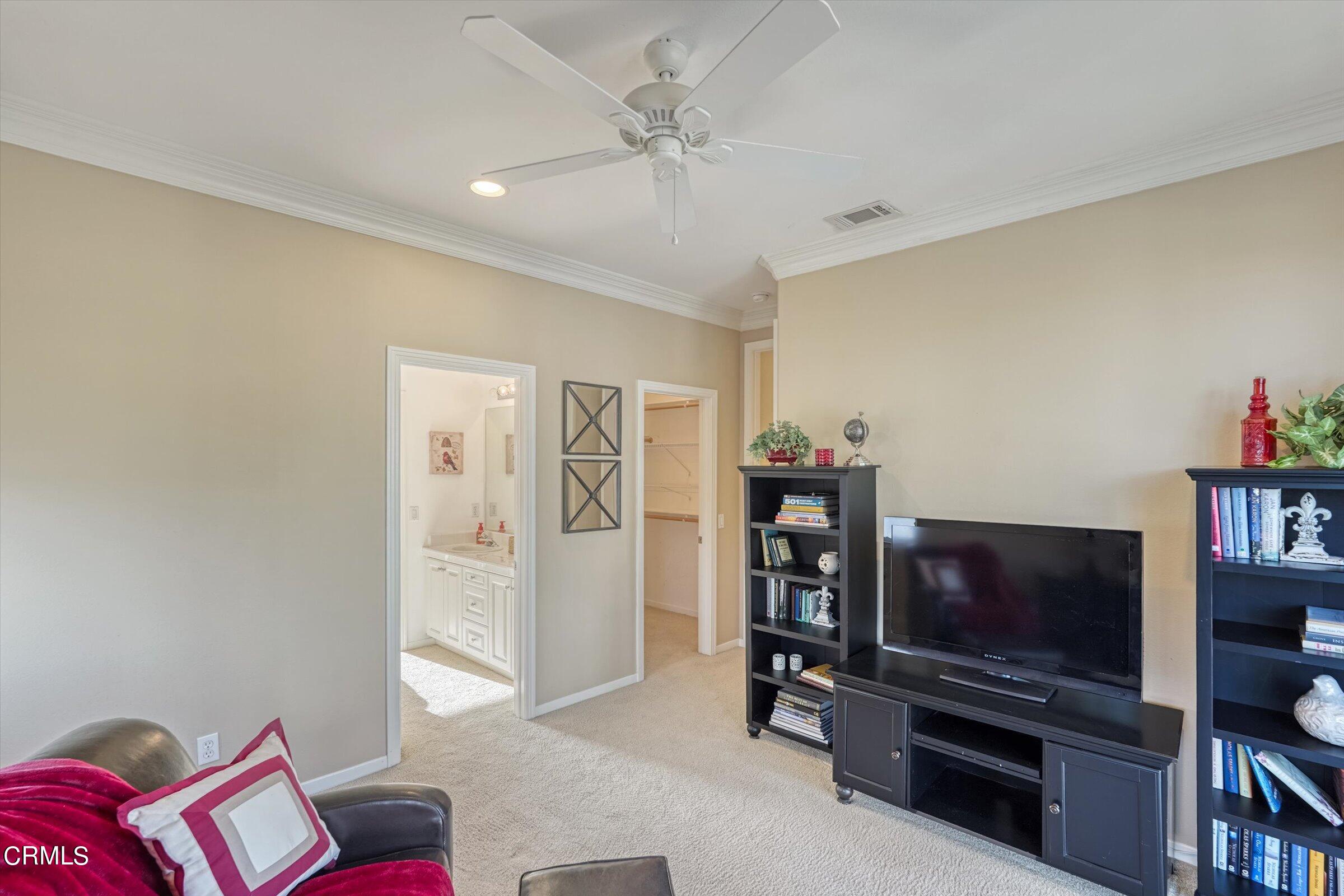 3315 Rising Star Avenue Simi Valley, CA 93063 - Photo 39 of 74 a living room with furniture and a flat screen tv