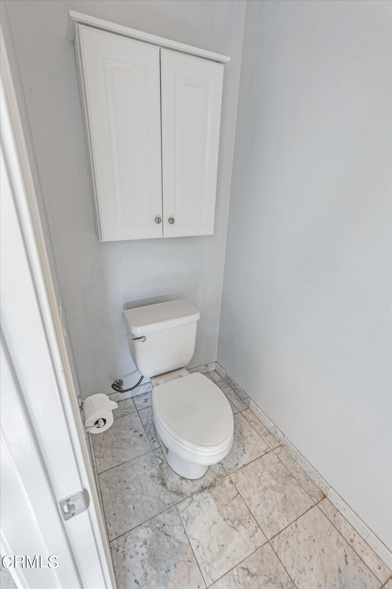 3315 Rising Star Avenue Simi Valley, CA 93063 - Photo 58 of 74 a white toilet sitting next to a shower