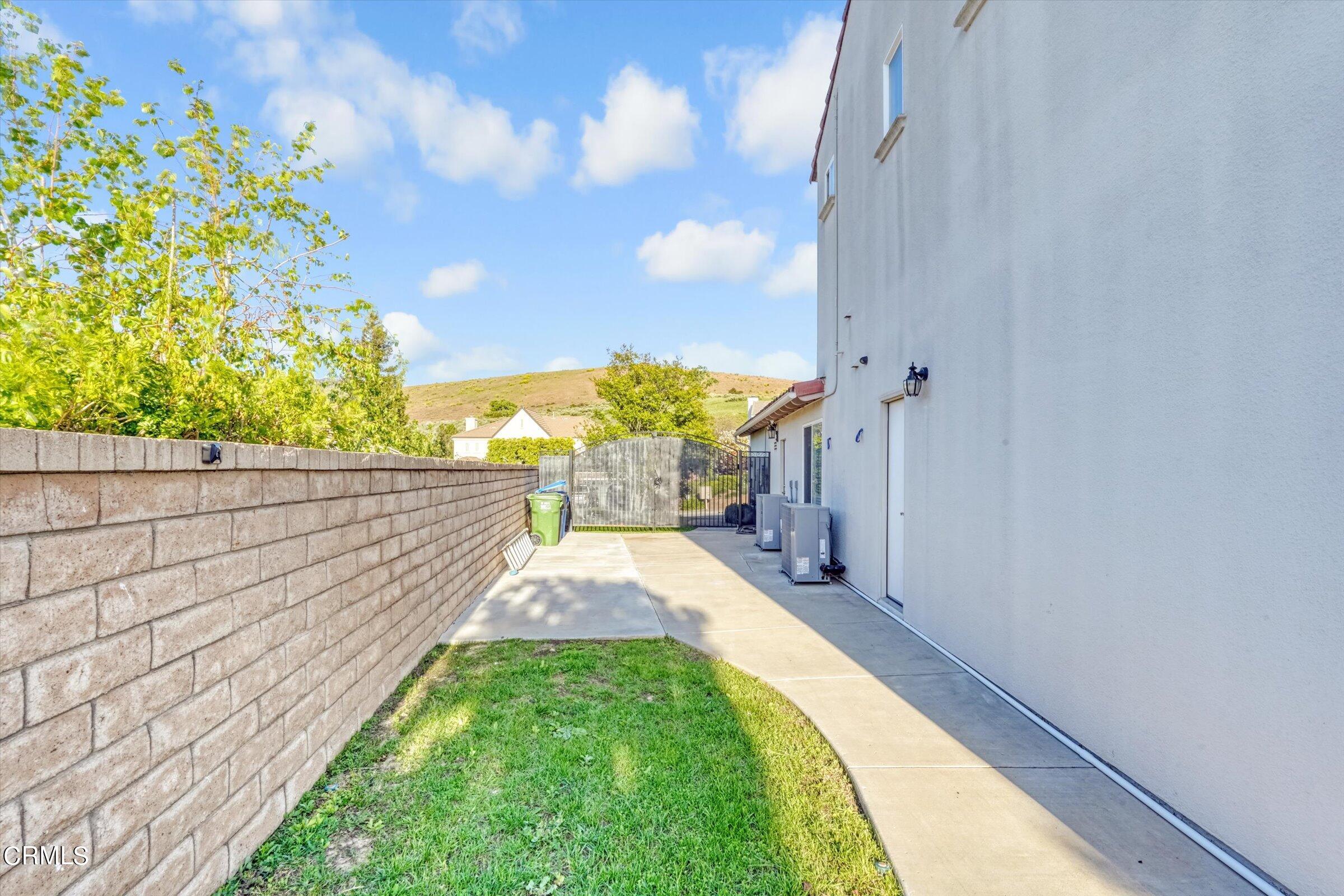 3315 Rising Star Avenue Simi Valley, CA 93063 - Photo 70 of 74 a view of a balcony with floor to ceiling windows with wooden fence
