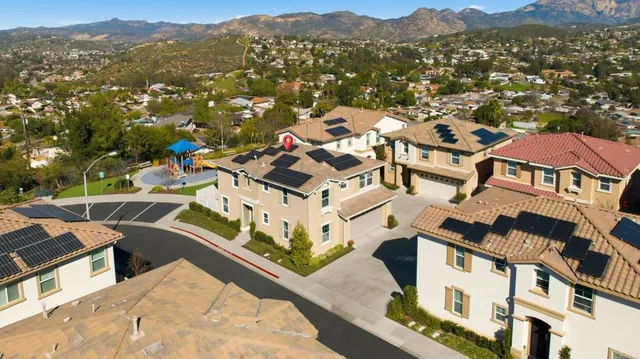 an aerial view of a city with lots of residential buildings