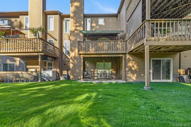 a view of a building with a yard