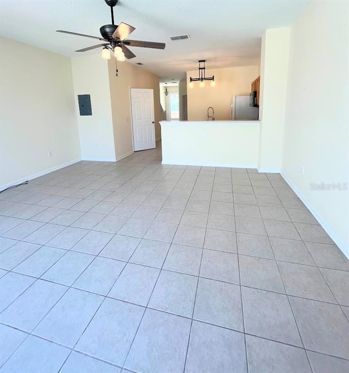 2534 Maneshaw Lane Kissimmee, FL 34747 - Photo 11 of 40 a view of a livingroom with a furniture