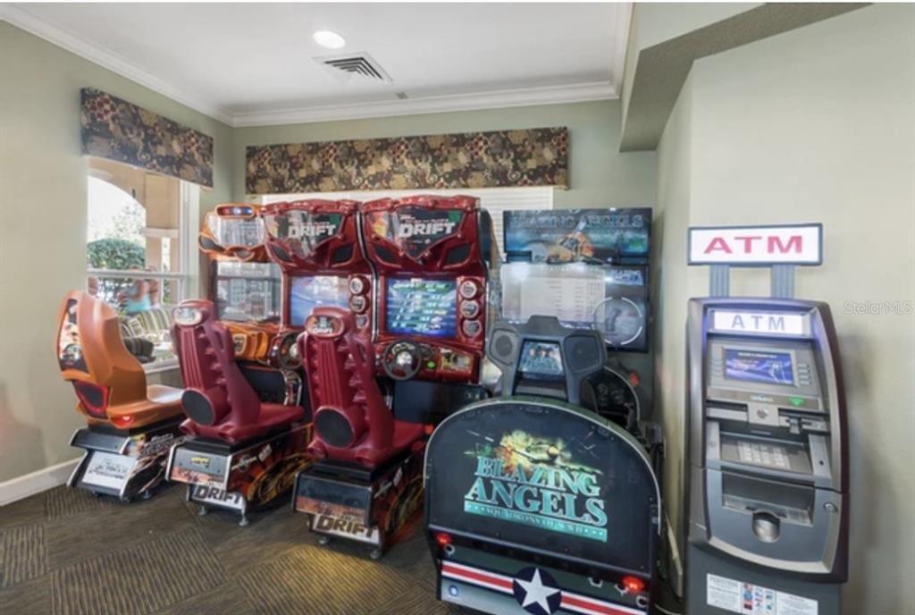 2534 Maneshaw Lane Kissimmee, FL 34747 - Photo 37 of 40 a room with lots of furniture and clutter