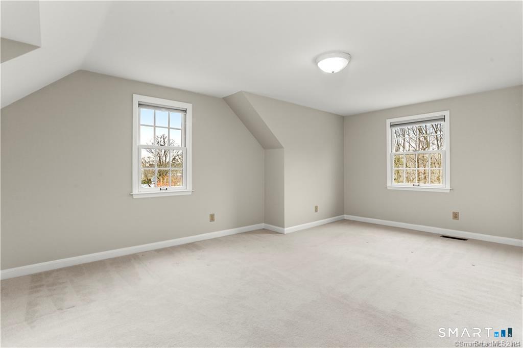608 Stillson Road Fairfield, CT 06824 - Photo 10 of 16 an empty room with windows