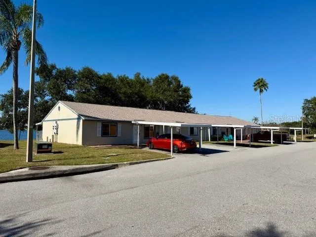 a view of an house with outdoor space and porch