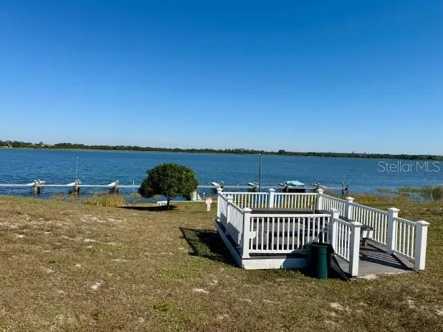a view of roof deck with ocean view