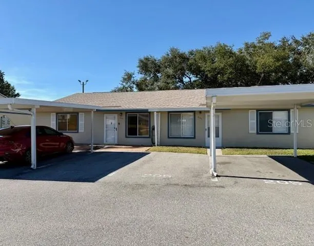 front view of a house with a patio