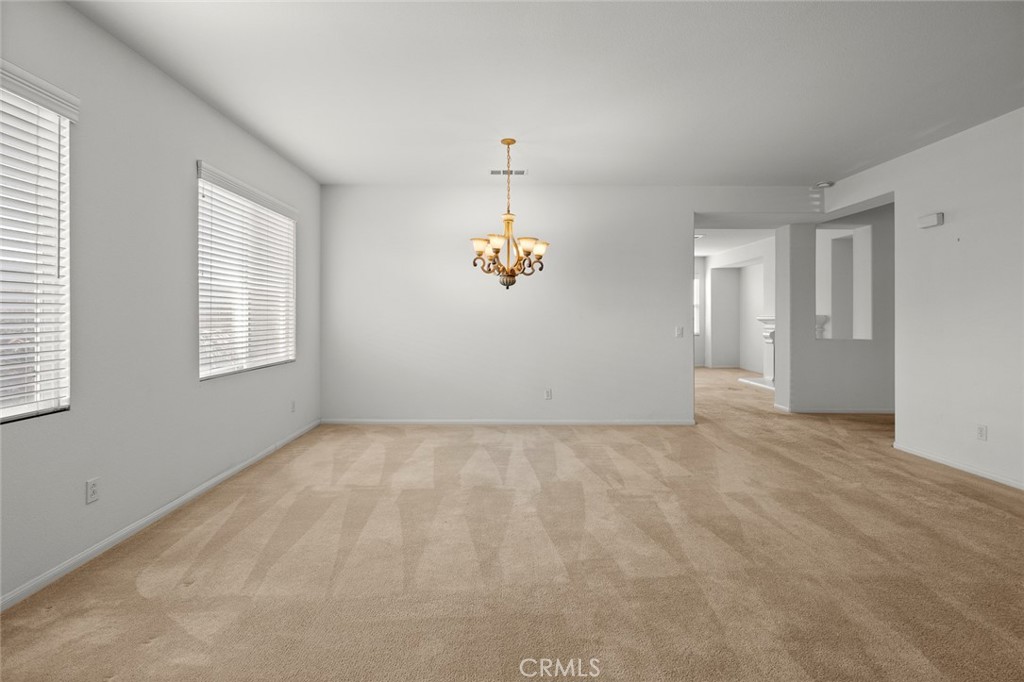 44855 Rutherford Street Temecula, CA 92592 - Photo 11 of 31 a view of an empty room with a window