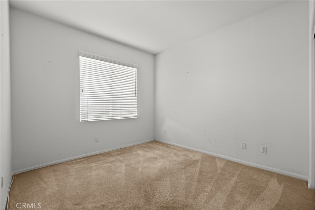 44855 Rutherford Street Temecula, CA 92592 - Photo 18 of 31 an empty room with a window