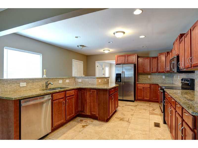 1933 Lomita Road Southeast Atlanta, GA 30316 - Photo 1 of 1 Kitchen. Gourmet Kitchen with Stainless Applicances, Custom Cabinets, Granite Counters, Travertine Backsplash!