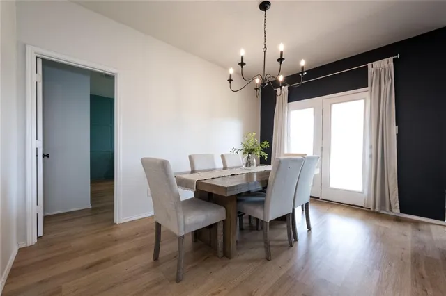 a view of a living room a couch and a ceiling fan