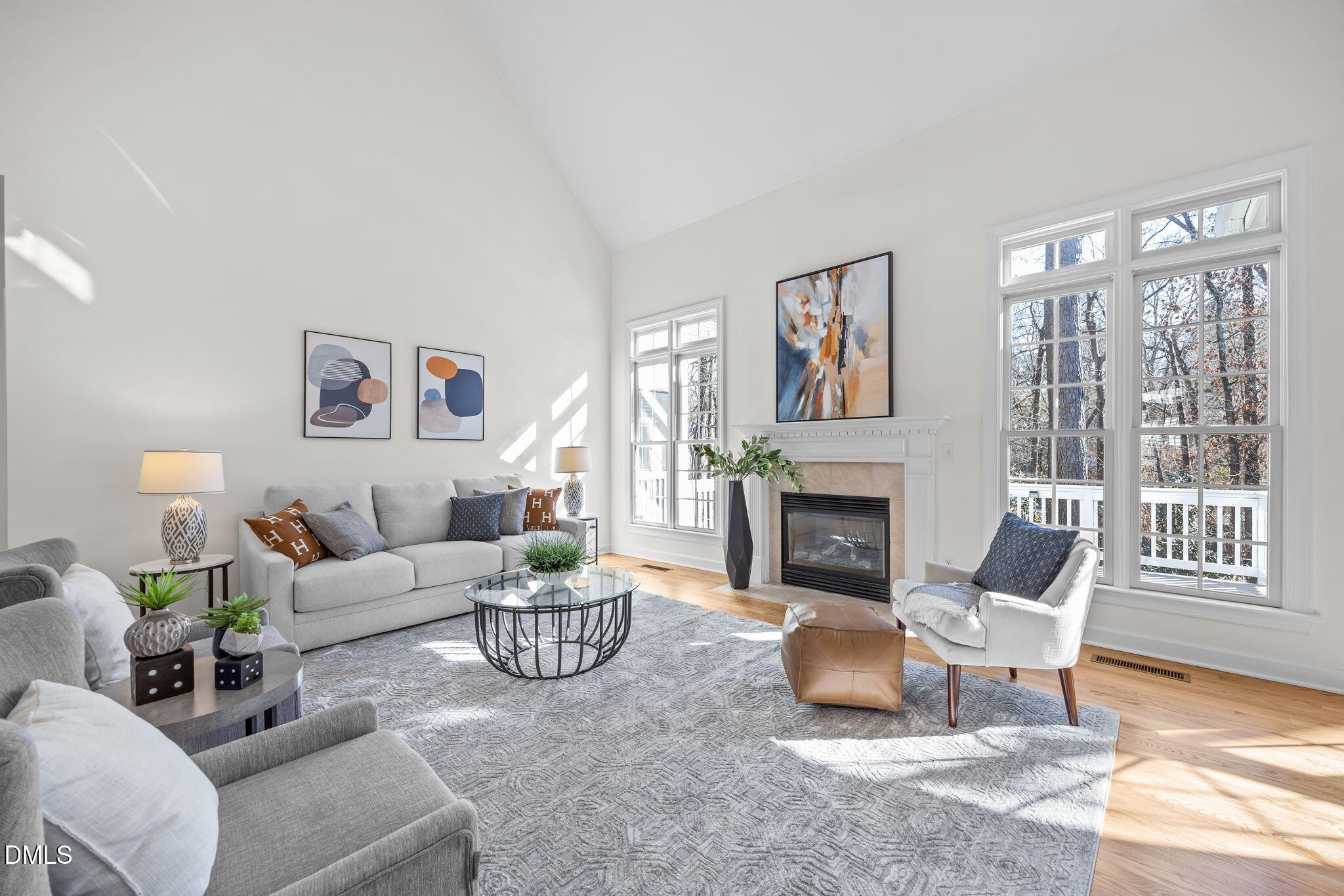 13 Morgans Ridge Lane Durham, NC 27707 - Photo 12 of 53 a living room with furniture a fireplace and a large window
