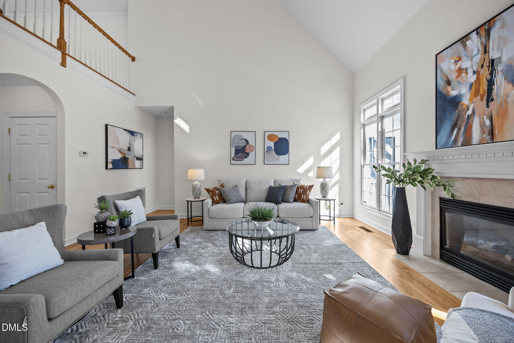13 Morgans Ridge Lane Durham, NC 27707 - Photo 14 of 53 a living room with furniture a fireplace and a potted plant