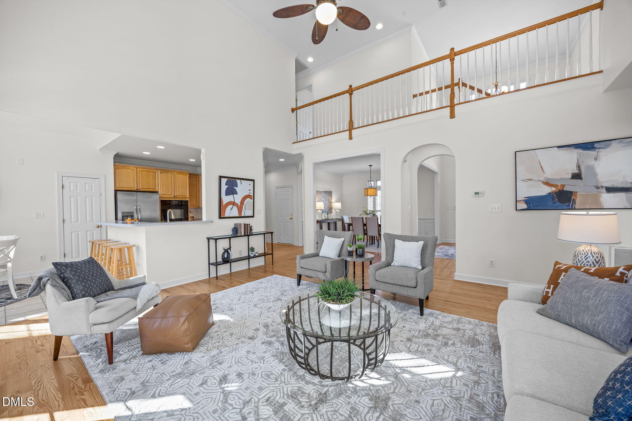 13 Morgans Ridge Lane Durham, NC 27707 - Photo 15 of 53 a living room with furniture or couch and a chandelier