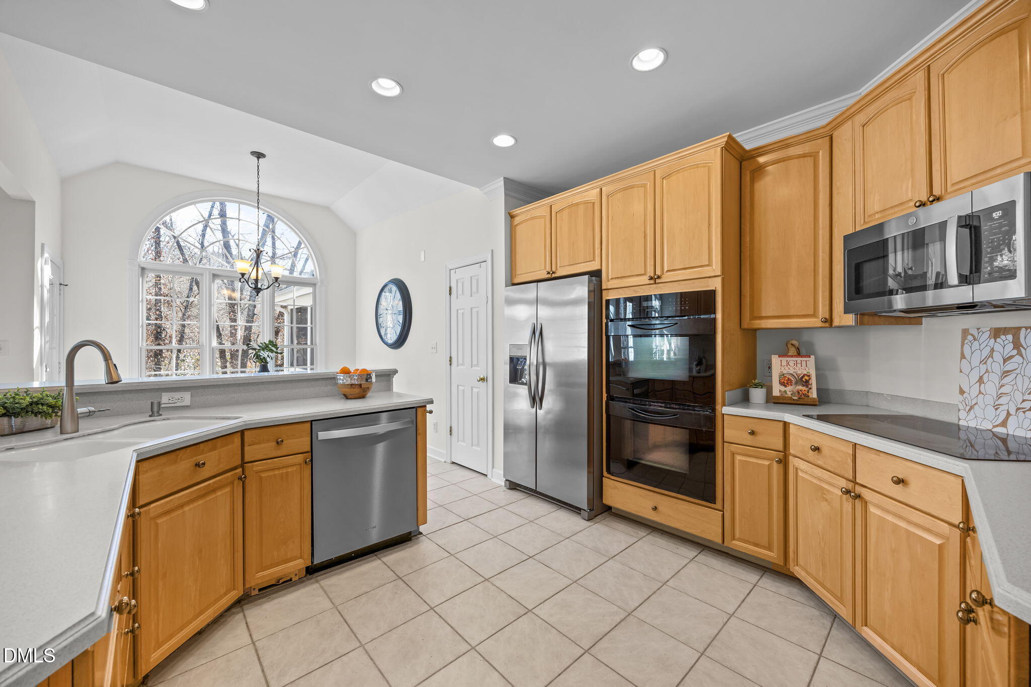 13 Morgans Ridge Lane Durham, NC 27707 - Photo 16 of 53 a large kitchen with stainless steel appliances granite countertop a stove and cabinets
