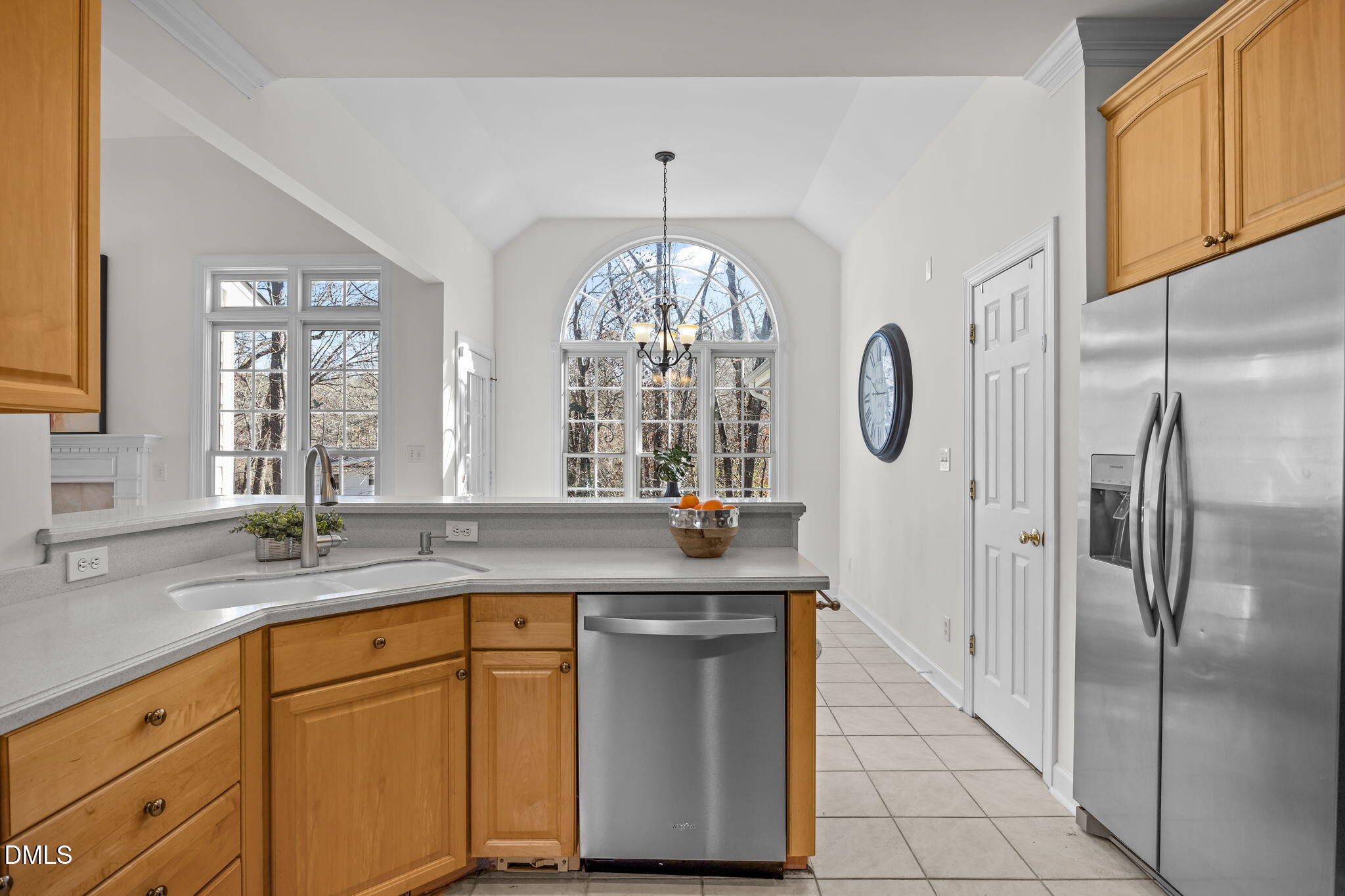 13 Morgans Ridge Lane Durham, NC 27707 - Photo 17 of 53 a kitchen with stainless steel appliances granite countertop a sink a window and a refrigerator