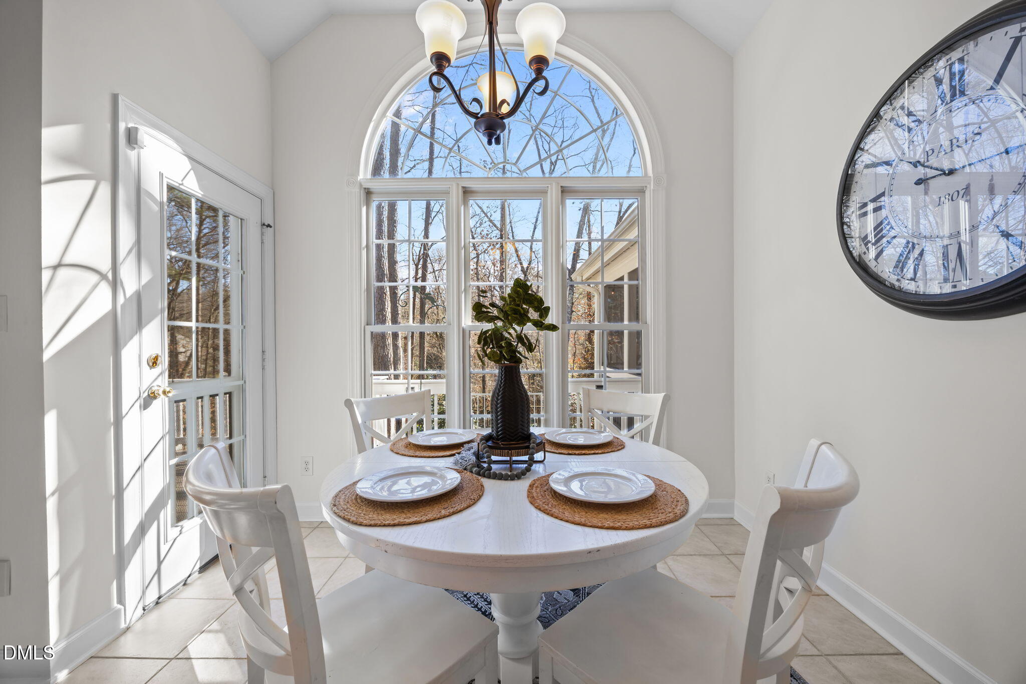 13 Morgans Ridge Lane Durham, NC 27707 - Photo 20 of 53 a view of a dining room with furniture wooden floor and chandelier