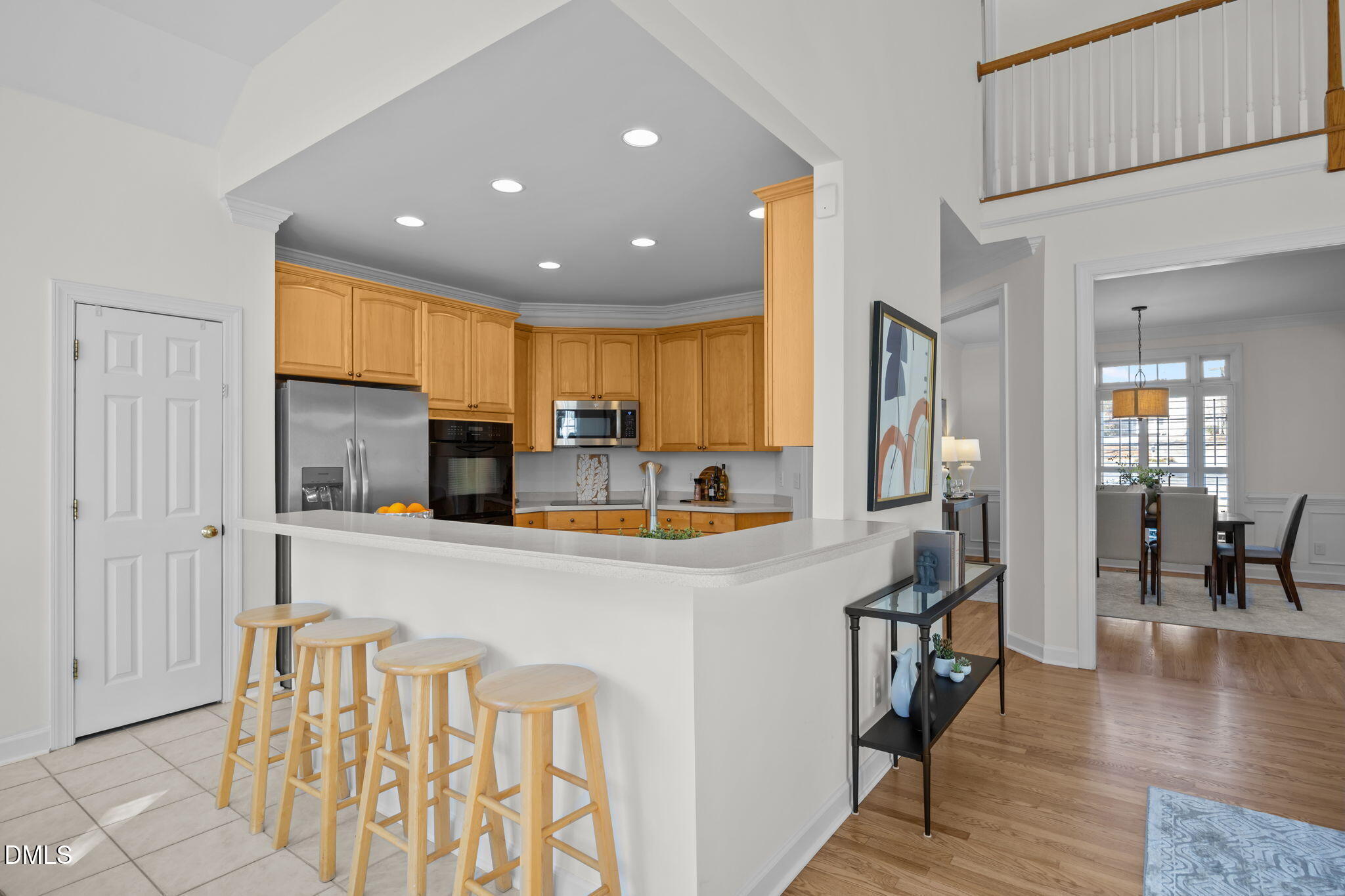 13 Morgans Ridge Lane Durham, NC 27707 - Photo 22 of 53 a kitchen with stainless steel appliances granite countertop a refrigerator and a stove top oven