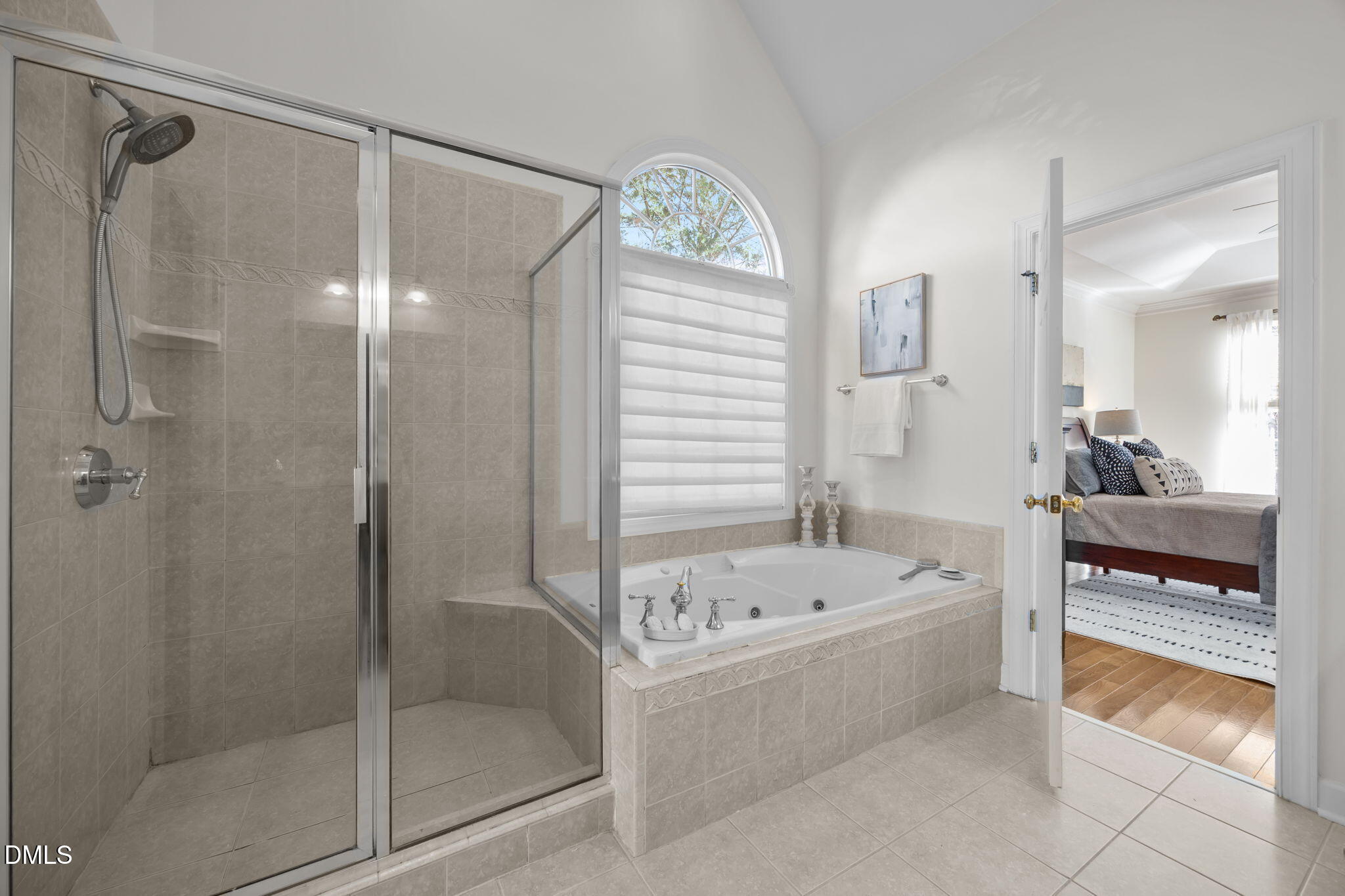 13 Morgans Ridge Lane Durham, NC 27707 - Photo 26 of 53 a bathroom with a tub a sink and a large mirror