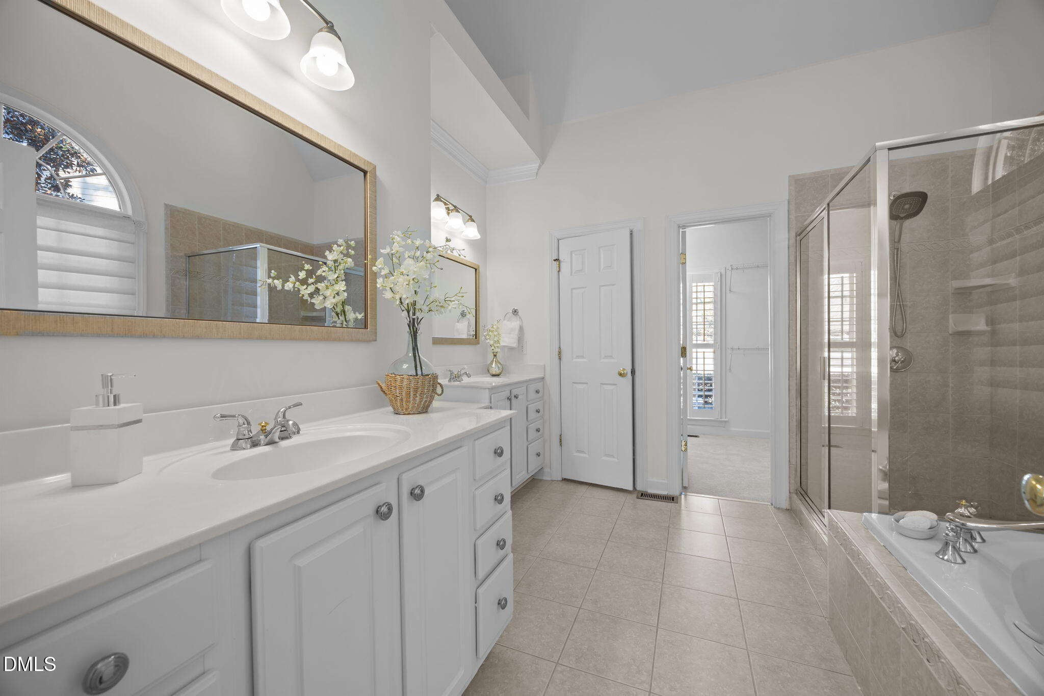 13 Morgans Ridge Lane Durham, NC 27707 - Photo 27 of 53 a spacious bathroom with a shower sink double and mirror