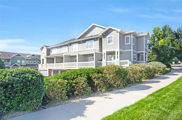 a view of a building with a garden