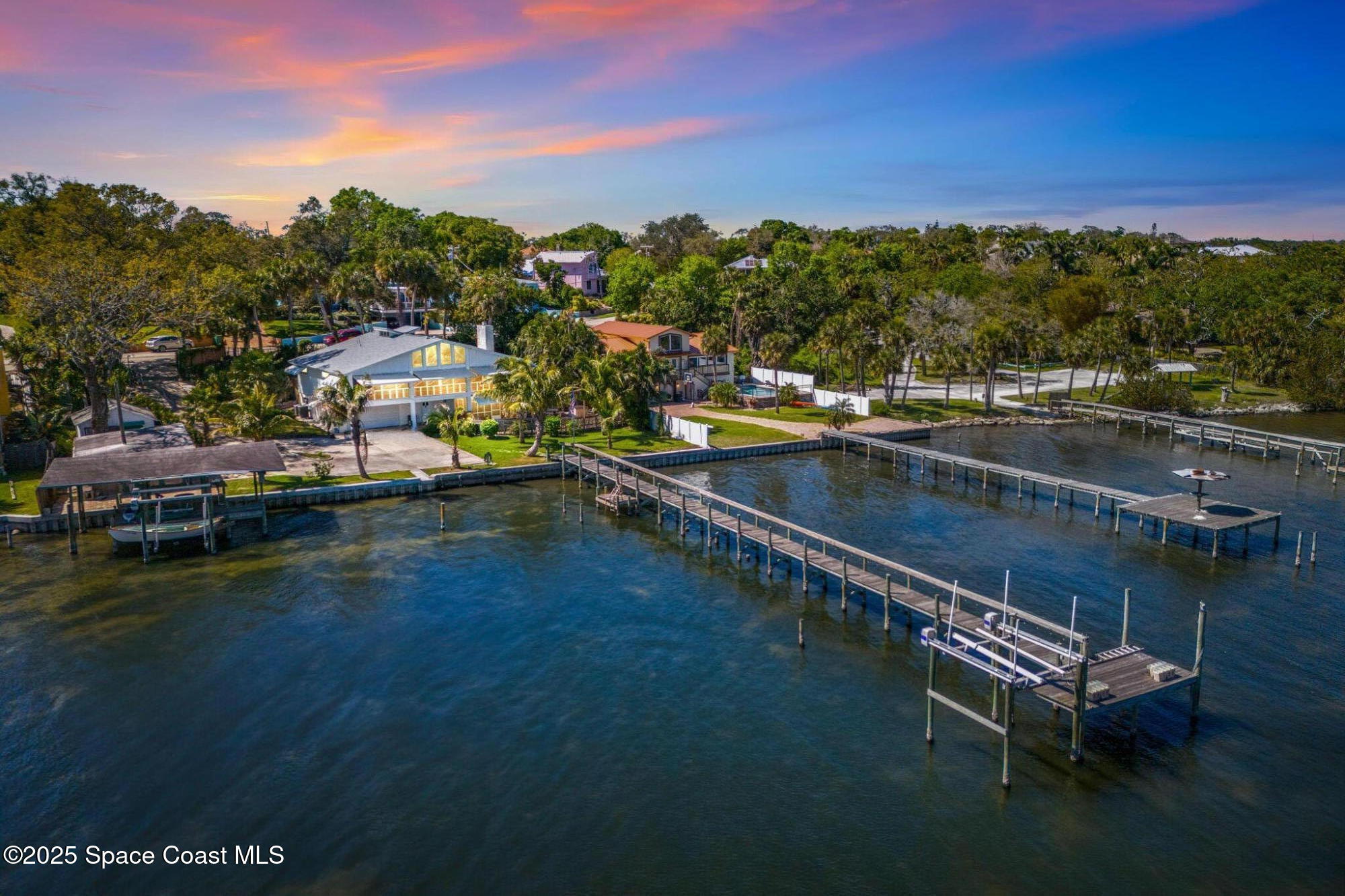 2016 Indian River Drive Cocoa, FL 32922 - Photo 1 of 49 a view of swimming pool with outdoor seating and lake view