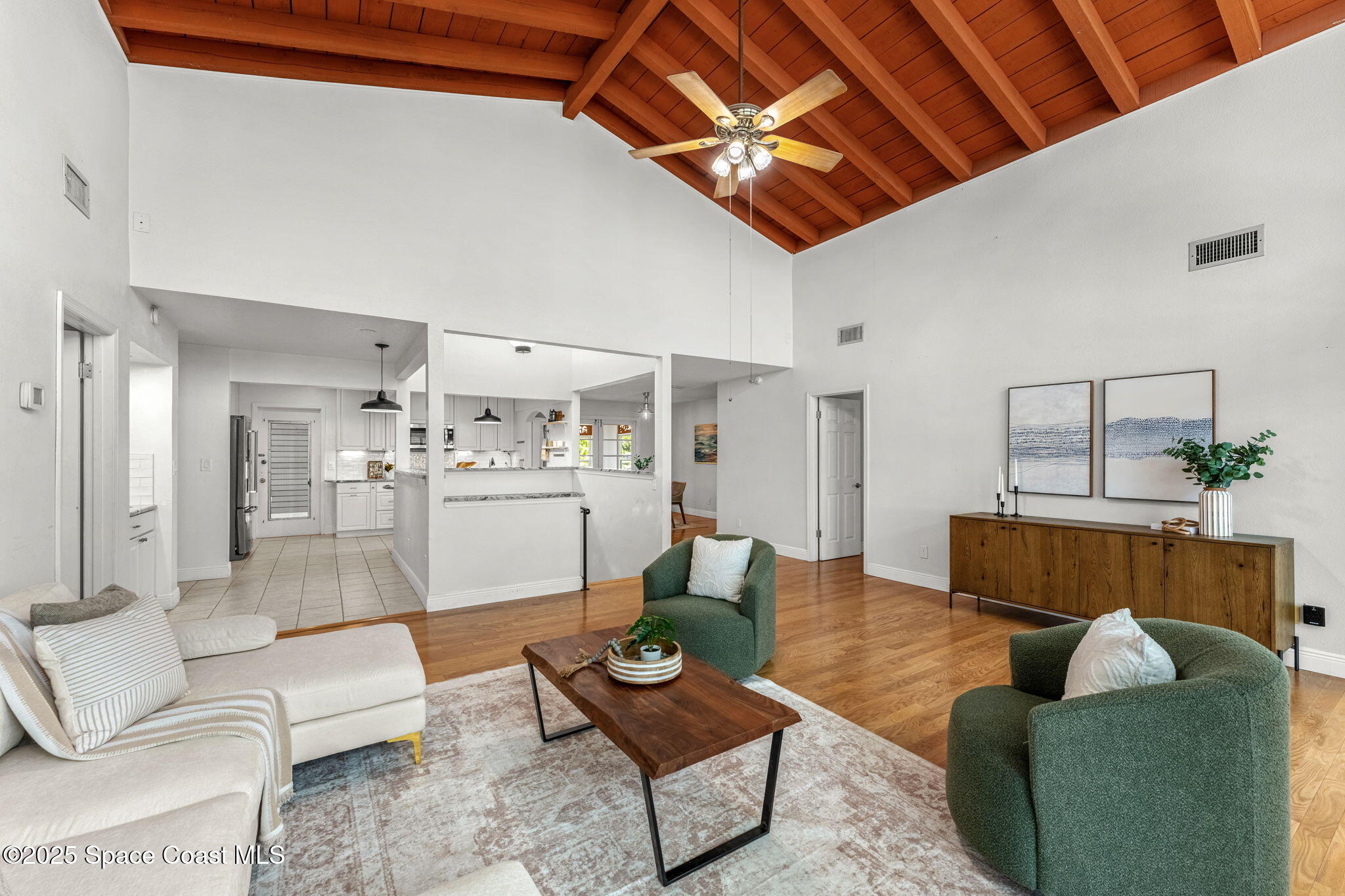 2016 Indian River Drive Cocoa, FL 32922 - Photo 11 of 49 a living room with furniture and view of kitchen