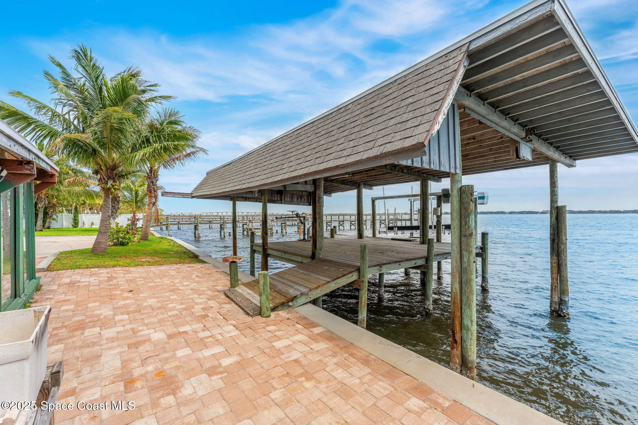2016 Indian River Drive Cocoa, FL 32922 - Photo 33 of 49 a view of a house with backyard and sitting area