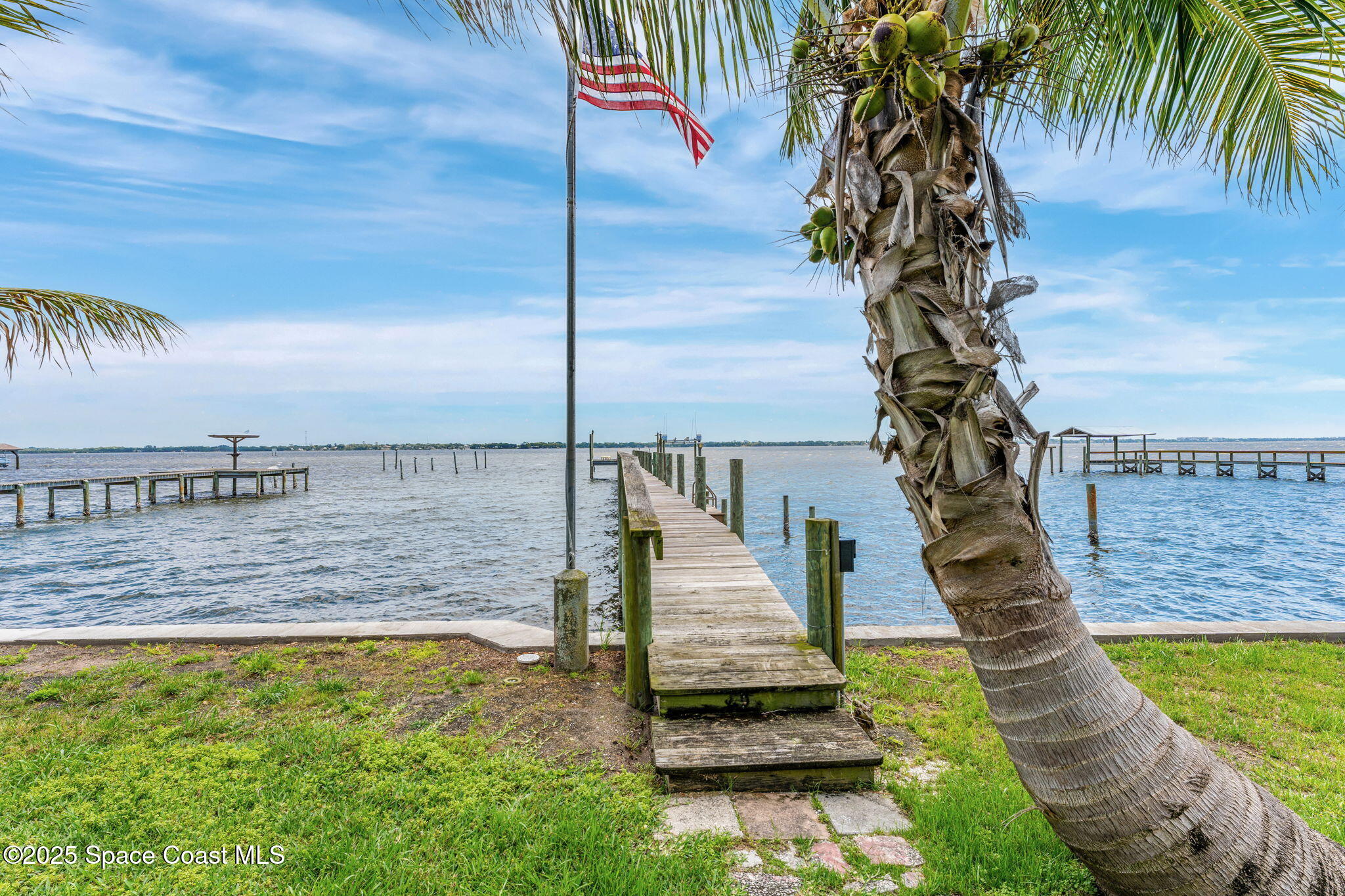 2016 Indian River Drive Cocoa, FL 32922 - Photo 42 of 49 a view of a balcony with floor and a palm tree