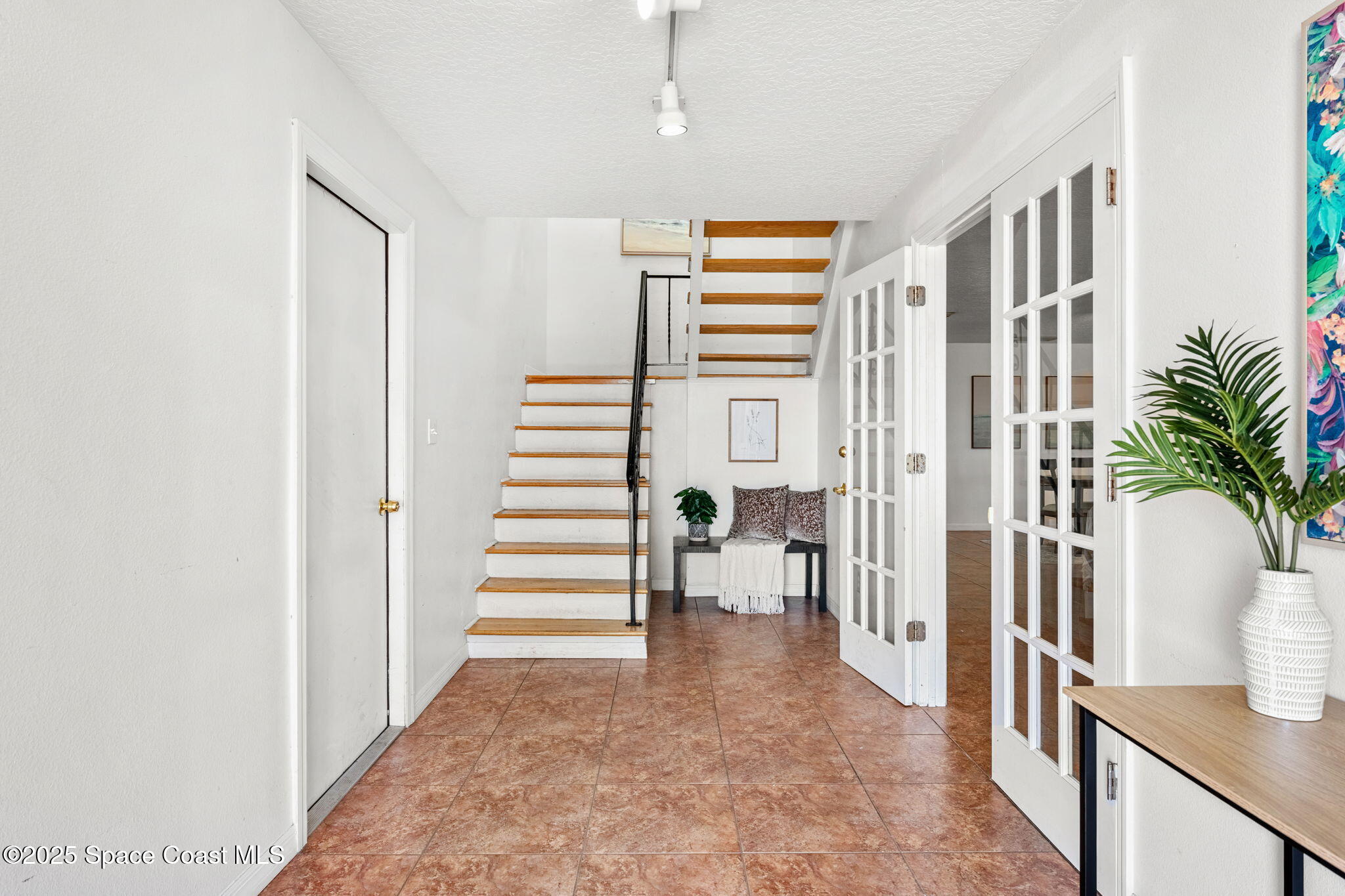 2016 Indian River Drive Cocoa, FL 32922 - Photo 7 of 49 a view of a hallway with wooden floor and entryway