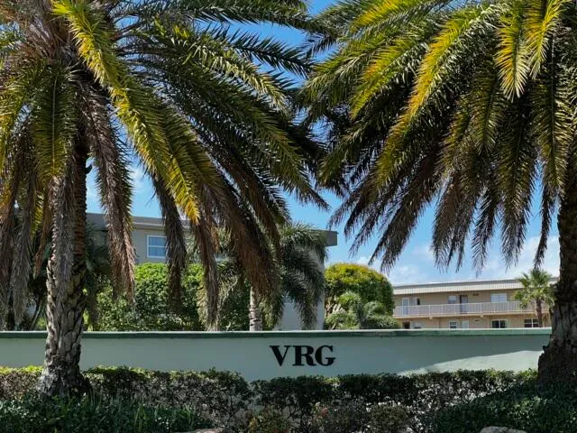 front view of a house with a garden