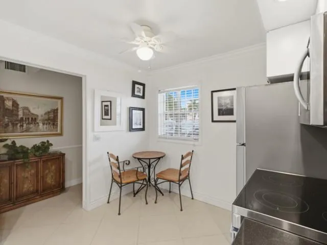a view of a livingroom with furniture and window