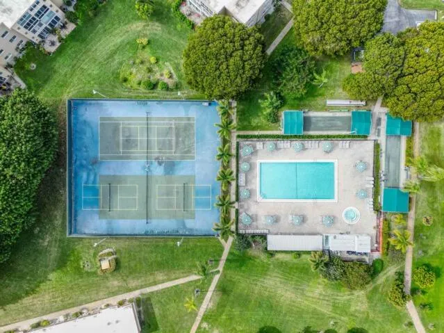 an outdoor space with patio and chairs