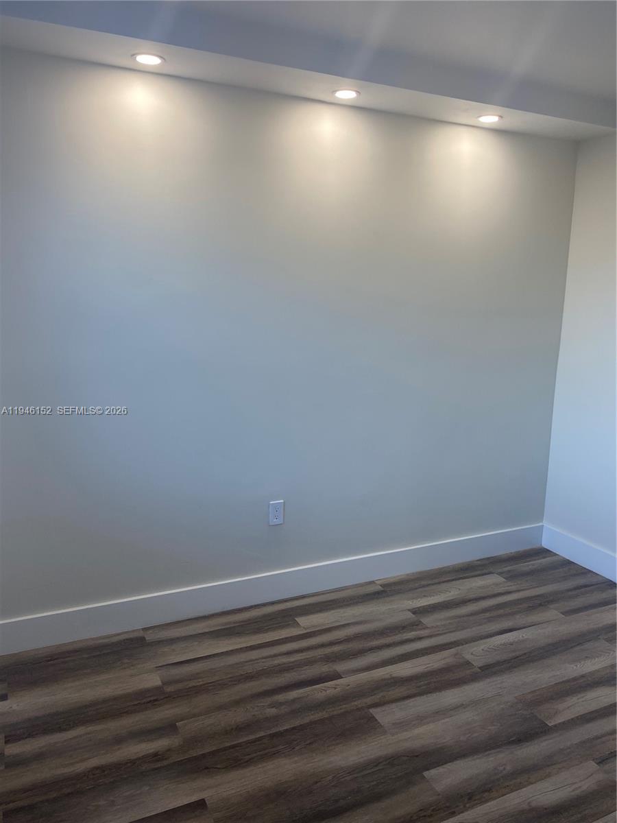 2575 Southwest 27th Avenue, Unit 212 Coconut Grove, FL 33133 - Photo 10 of 12 a view of an empty room