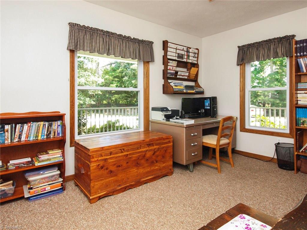 571 Ridge Road Mocksville, NC 27028 - Photo 13 of 30 Living Room/Office to the right as you enter the home. Access from the kitchen side as well.