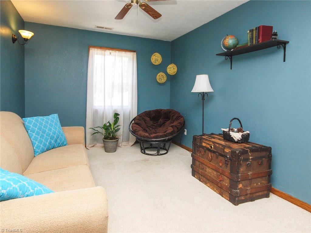 571 Ridge Road Mocksville, NC 27028 - Photo 18 of 30 Upstairs Bonus Room used for the 4 bedrooms on this level .