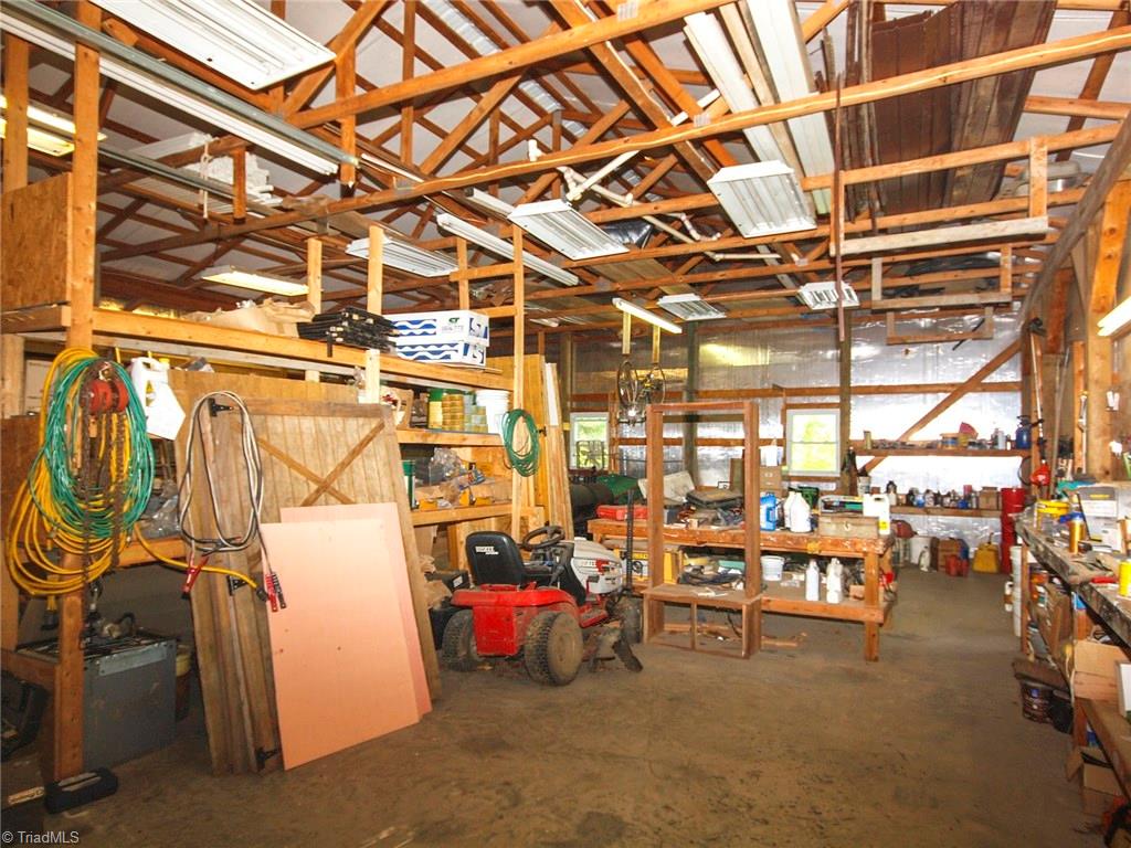 571 Ridge Road Mocksville, NC 27028 - Photo 28 of 30 Garage/ Workshop Interior. Other side is just as big.